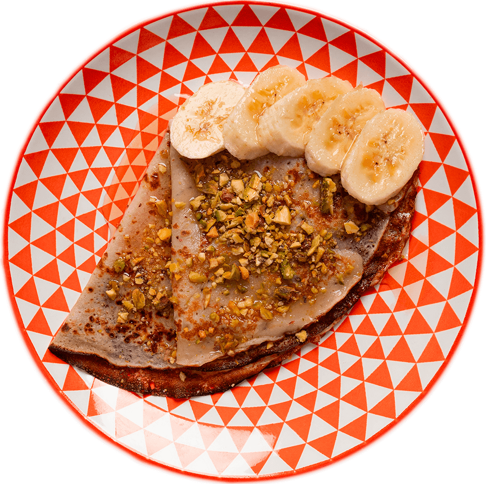 Dos Crepes de plátano y pistachos y sirope de arce